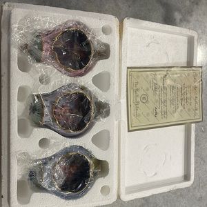 Lisa Janes enchanted Gardens Heirloom Porcelain Ornament Collection.